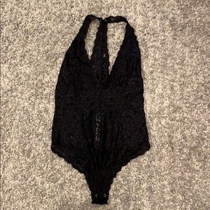 Black lace racer back bodysuit from Free people